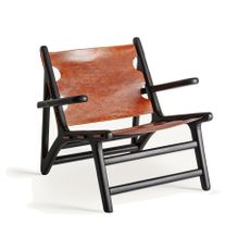 Estila Luxusné vintage tehlovo červené kožené kreslo Huron s čiernymi drevenými nožičkami 82 cm