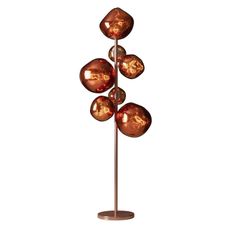 Estila Glamour bronzová stojaca lampa Kalan so siedmimi sklenenými tienidlami v tvare kvapiek a okrúhlou kovovou podstavou 170 cm