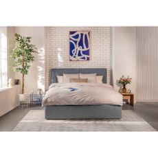 Modrá čalúnená dvojlôžková posteľ s úložným priestorom s matracom/s roštom 180x200 cm Thessa Bold – Bonami Selection