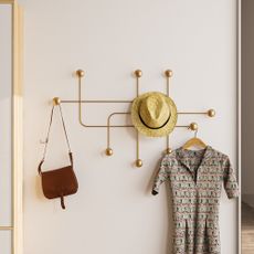 Kovový nástenný vešiak v zlatej farbe Dama – Kalune Design