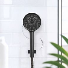 Matne čierna plastová sprchová hlavica ø 12 cm Softwater – Wenko