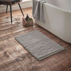 Sivá kúpeľňová predložka 50x80 cm Aspen Bobble – Bianca