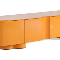 Estila Art deco oranžový oválny štvordverový TV stolík Munios s lesklým hladkým povrchom s oblými hranami a oválnymi nožičkami 220 cm