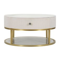 Estila Art deco okrúhly krémový konferenčný stolík Glamia Tapisé s dvomi zásuvkami a so zlatou konštrukciou s bielou doskou 75 cm