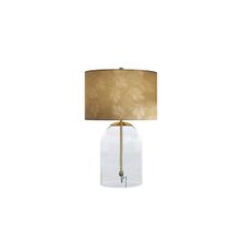 Estila Glamour zlatá stolná lampa Gambier s okrúhlym tienidlom so vzorom palmových listov a priehľadnou sklenenou podstavou 55 cm