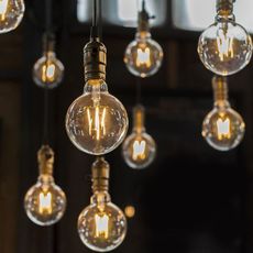 LED Žiarovka FILAMENT G125 E27/10W/230V 4000K