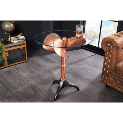 Estila Koloniálny okrúhly príručný stolík Helice s nohou v medenej farbe s dizajnom lodnej skrutky a sklenenou vrchnou doskou 73 cm