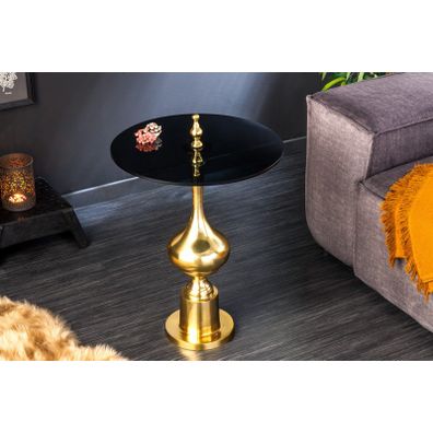 Estila Luxusný art deco príručný stolík Marietta so zlatou ozdobnou podstavou a čiernou okrúhlou vrchnou doskou 65cm