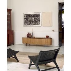 Čierne kreslo s výpletom Calixta - Kave Home