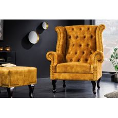 Estila Chesterfield kreslo Cella so zamatovým čalúnením v horčicovo žltej farbe s tmavohnedými masívnymi nožičkami 105cm