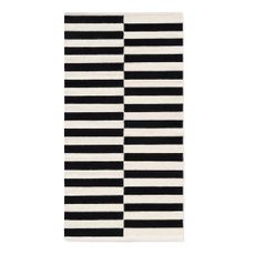 Čierno-biely obojstranný ručne tkaný vlnený koberec 80x150 cm Donna – Hanse Home